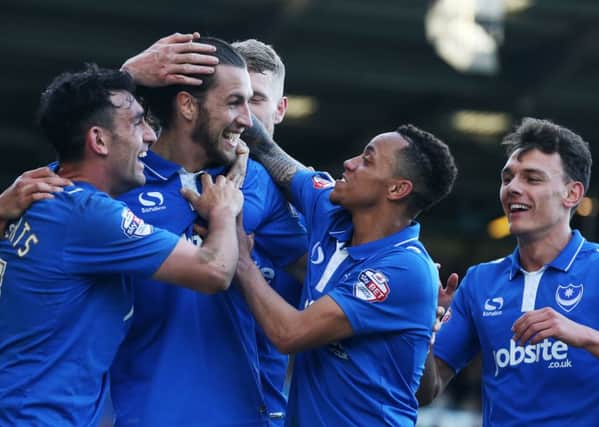 Pompey celebrate during their 4-0 thrashing of Notts County at Fratton Park. Picture: Joe Pepler