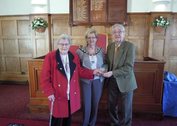 John and Eileen Hellyer being presented their award by mayor Marian Ayres. Picture: Littlehampton Town Council