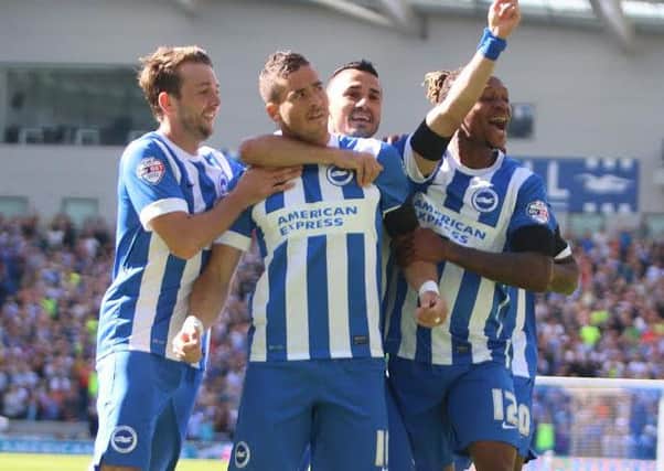 Brighton's players celebrate a goal. Picture by Angela Brinkhurst