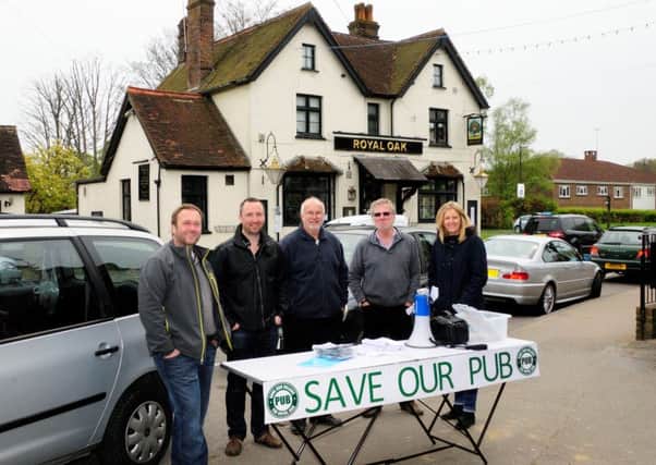 Crawley Down villagers in their 'Save Our Pub' campaign SUS-160505-131412001
