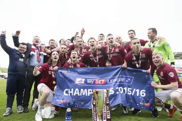 Northampton celebrate being named League Two champions Picture: Kirsty Edmonds