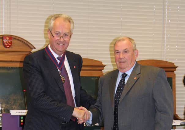Colin Belsey (right) and Michael Ensor the past new and new chairman at East Sussex County Council (photo submitted). SUS-161105-133355001