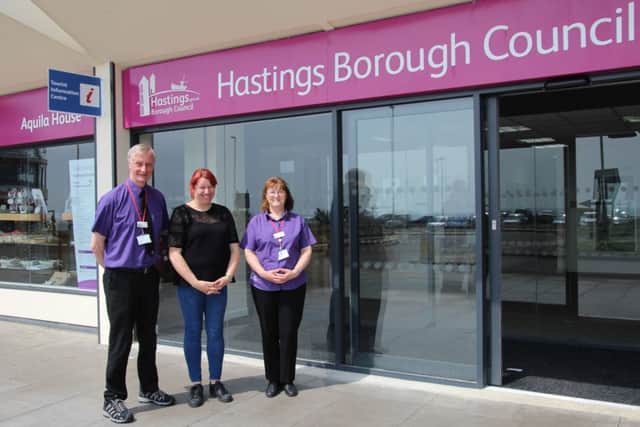 The newly reopened Hastings Tourist Information Centre. Cllr Poole is pictured with TIC staff. SUS-160518-161508001