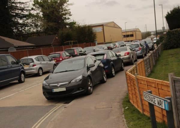 Cars block Parsonage Way in Horsham