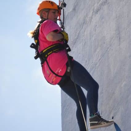 Jody Blunt from Pound Hill, Crawley, abseils down the Spinnaker Tower for Brain Tumour Research - picture submitted