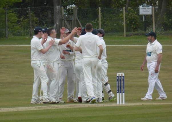 Chichester celebrate a wicket at Crowhurst Park / Picture by Simon Newstead