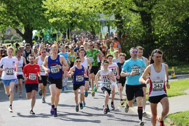 Runners pace down from the start of the first-ever Run Wisborough on Sunday