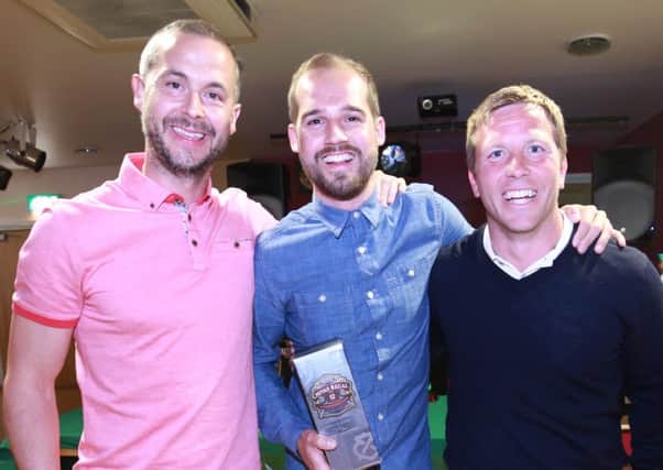 Darin Killpartrick and Jamie Howell present Dan Beck with the players' player of the year award / Picture by Tim Hale