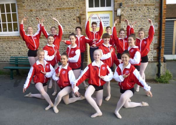 JBS Dance students modelling their Dance World Cup tracksuits