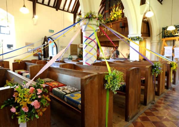 The pews were draped in ribbons for the maypole arrangement SR1612699