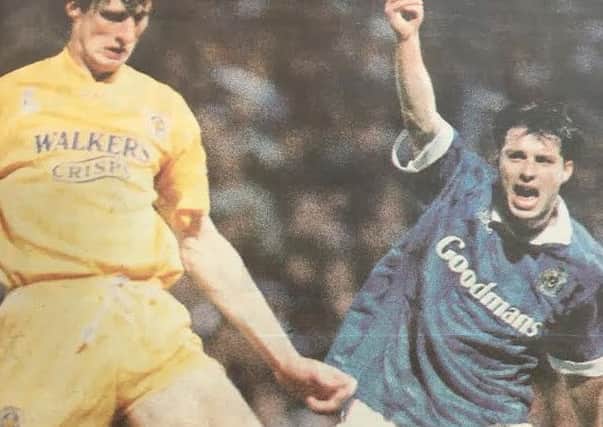 Leicester City striker Ian Ormondroyd taps the ball into the back of the Pompey net, as Blues defender Kit Symons appeals for offside, during the 1993 Division One play-off semi-final at Fratton Park