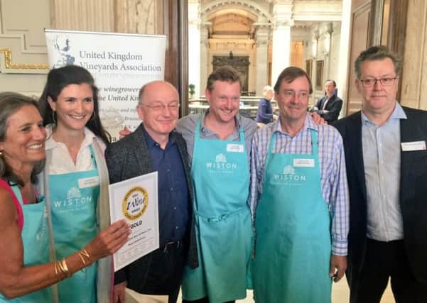 The Wiston Estate wins a Gold award at the International Wine Challenge for the Wiston Blanc de Blancs 2010 - (L-R) Pip Goring, Kirsty Goring, Oz Clark, Dermot Sugrue, Harry Goring & Peter McCrombie from IWC - picture submitted by the Wiston Estate