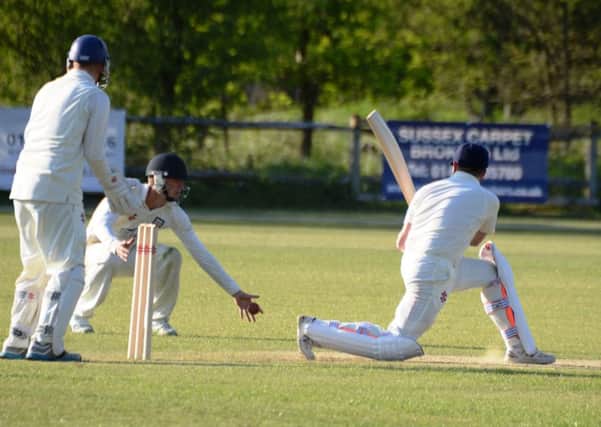 Shawn Johnson takes a brilliant one-handed catch for Bexhill Cricket Club against Billingshurst SUS-161005-131102002