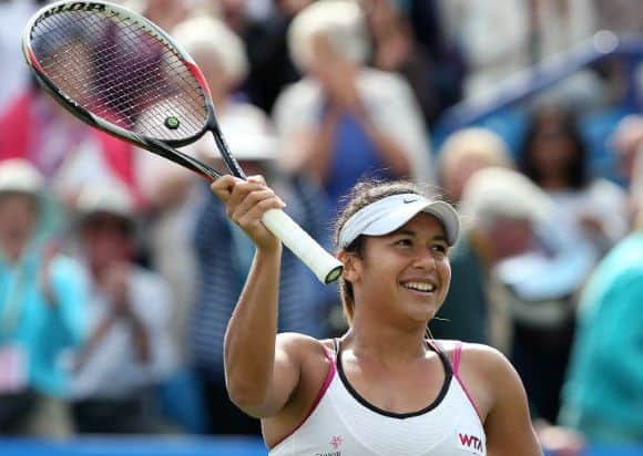 EASTBOURNE, ENGLAND - JUNE 18:  Heather Watson of Great Britain celebrates match point against Flavia Pennetta of Italy during their Women's Singles match on day five of the Aegon International at Devonshire Park on June 18, 2014 in Eastbourne, England. (Photo by Jan Kruger/Getty Images) SUS-140619-133805002