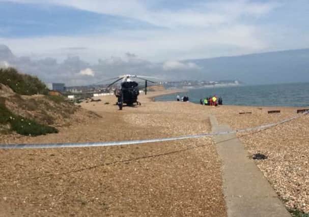 The air ambulance landed on the beach after the body was found. Photo by Jayan Jackson