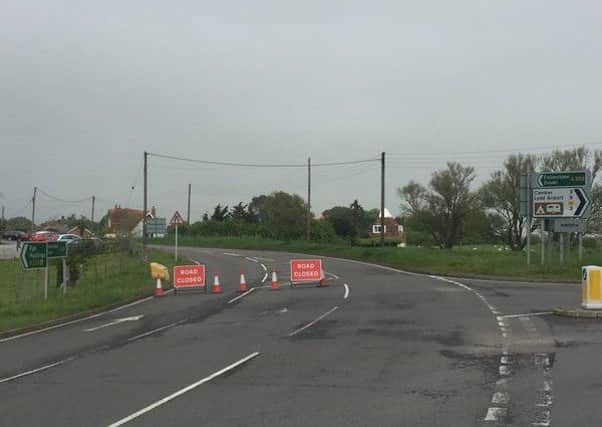 The road is closed from Camber Road to the A2070 after the incident in Brookland. Photo courtesy of Sussex Police