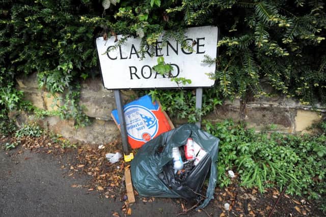 Bin bags full of rubbish left on Clarence Road