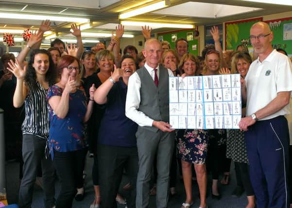 Head teacher Richard Cave and teaching staff at Sompting Village Primary School wish Kevin Woodgate well on his retirement