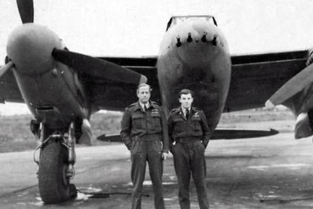 Group Captain Pickard and his navigator, Flight Lieutenant Alan Broadly DSO DFC DFM, pose in front of their Mosquito shortly before the raid on Amiens Prison during which they were shot down and killed.