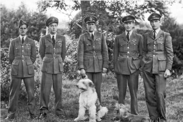 Pick Pickard (centre) with some of his 161 Squadron pick-up pilots in the garden of Tangmere Cottage in 1943.