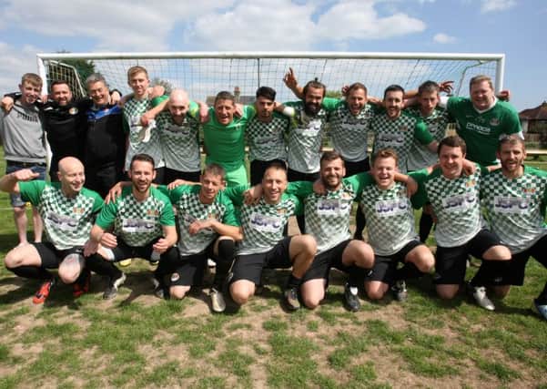 Lancing United celebrate winning the West Sussex League title