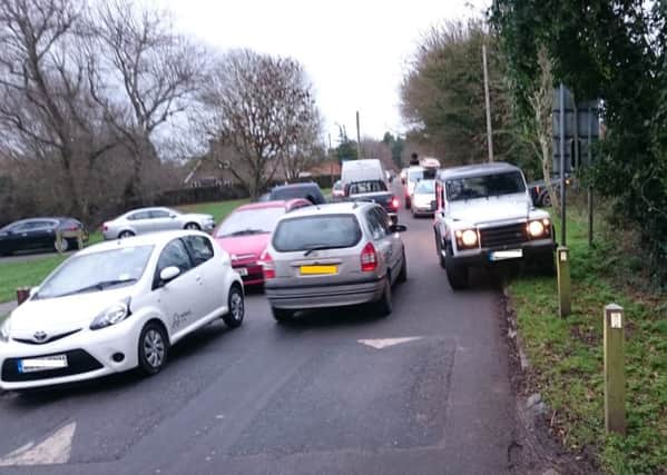 Traffic problems in Wellgreen Lane, Kingston (photo submitted). SUS-160518-144438001