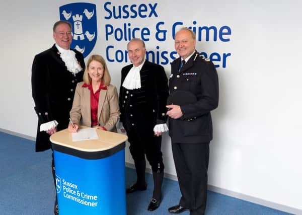 Newly elected Sussex Police & Crime Commissioner Katy Bourne swears oath of impartiality this week (12 May 2016) witnessed by the High Sheriffs of East and West Sussex Mark Spofforth and Michael Foster (LtoR) respectively and Chief Constable Giles York. SUS-160513-161535001