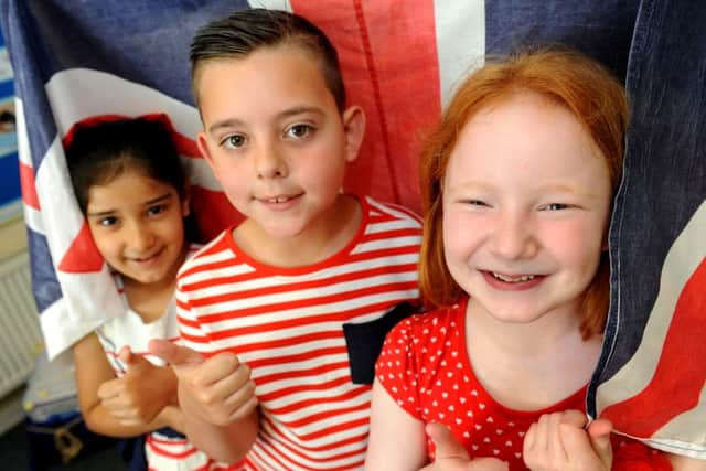 Our Lady Queen of Heaven school held a red, white and blue day to celebrate the Queen's 90th birthday. Pic Steve Robards  SR1613515 SUS-160513-174315001