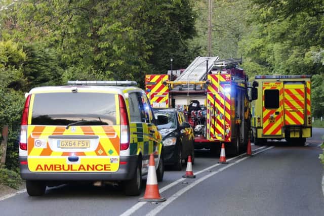 Emergency services attend the scene. Picture by Eddie Mitchell