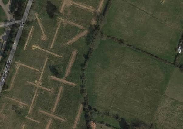 Investigative trenches are evident on the left, but campaigners believe the central field could have been home to a Roman Villa. Image courtesy of Google Earth