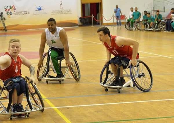 Lewis Edwards (far, right) in action for Great Britain at the Fazza International Wheelchair Basketball Tournament