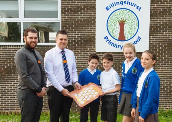 Billingshurst Primary School pupils with Sainsbury's staff who provided the children with a tasty breakfast during exam week