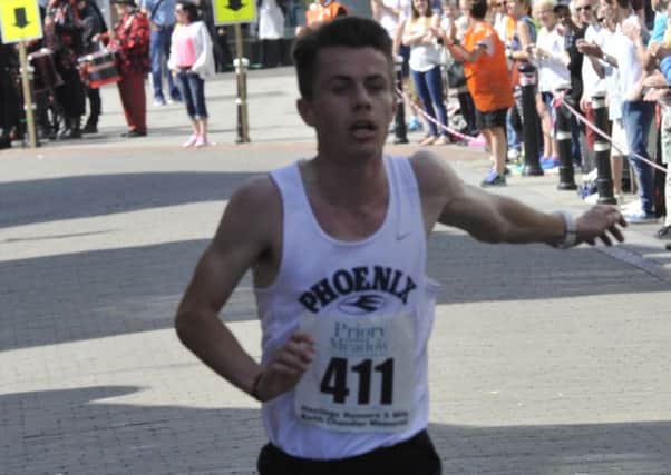 Ross Skelton won the 5,000m B race at the Sportcity Grand Prix in a personal best time