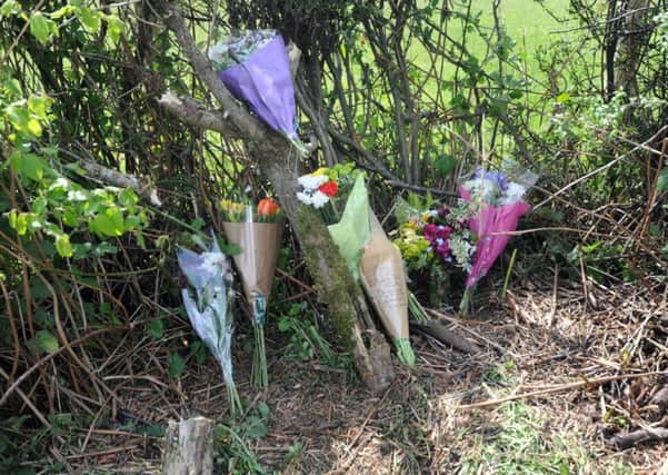 Flowers on the B2096 left in tribute to Mr Overy. SUS-160516-122803001