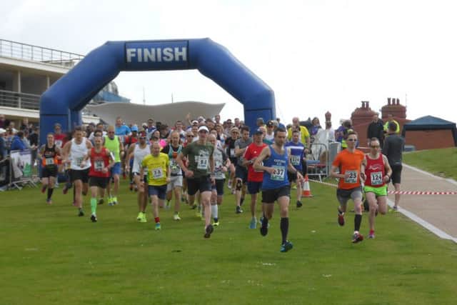 Runners set off at the start of the Bexhill Starfish Races (SUS-160518-155610002)