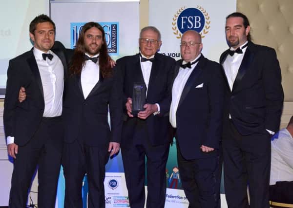 The Overall Business of the Year 
Sponsored by the Federation of Small Businesses.
Presented by Doug Thorogood, Chairman 1066 Country Branch
The Winners were The Source Hastings Ltd.

The 1066 Business Awards 2015 July 11th 2015 held at The Bannatyne Spa Hotel Hastings. SUS-150717-112935001