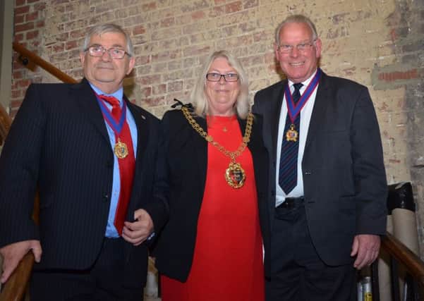 Mayor Judy Rogers with deputy Nigel Sinden (left) and outgoing mayor Bruce Dowling. Picture by Sid Saunders