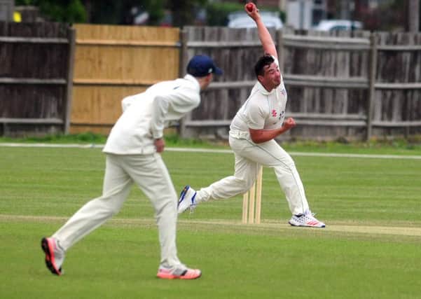 Andrew Greig turns his arm over for Bognor v Lindfield / Picture by Kate Shemilt