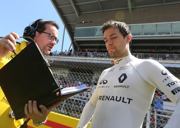 Jolyon Palmer (GBR) Renault Sport F1 Team with Julien Simon-Chautemps (FRA) Renault Sport F1 Team Race Engineer on the grid.
Spanish Grand Prix, Sunday 17th May 2016. Barcelona, Spain.
