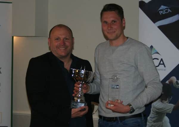 Sam Fisk receiving the Player of the Year award from the Ian Chapman