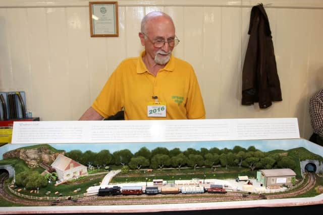 Sompting and District Model Railway Club Annual Exhibition. Peter Briggs with his layout. Photo by Derek Martin SUS-160515-184833008