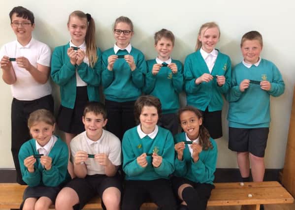 Kingslea pupils with their fabric patches