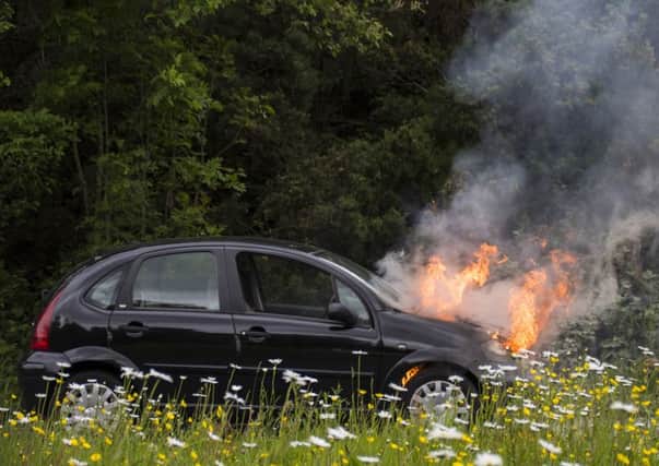 Car fire at Pease Pottage. Picture: Ronnie Barrett