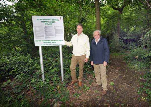 Christopher Wallace (Chairman - Ellerslie Area Residence Association) and Chris Ashford (Secretary) at the entrance to St Mary's Wood, Bexhill. SUS-160206-100856001