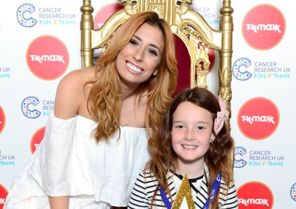 Stacey Solomon meets brave Bella Scriven at the circus themed Cancer Research UK Kids & Teens Star Awards party, held in partnership with TK Maxx, at The Roof Gardens, Kensington, The Star Awards celebrate all youngsters diagnosed with cancer who shine with courage. For more information visit cruk.org/kidsandteens SUS-160525-102523001