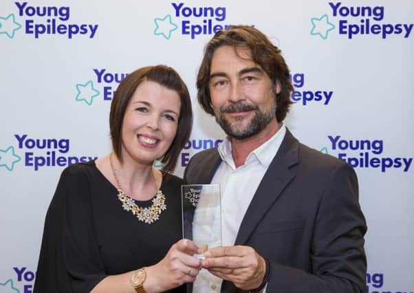 Epilepsy nurse, Kirsten McHale, wins a Young Epilepsy Champion Award for always going the extra mile to support children and families affected by epilepsy. Pictured with Actor Nathaniel Parker who presented the award - picture submitted