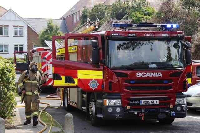 Fire crews deal with a garage fire in Worthing. Picture: Eddie Mitchell