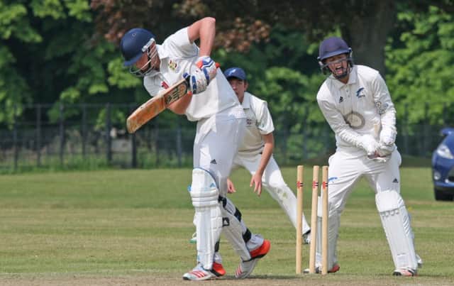 Adam Barton is bowled during Hastings Priory's defeat to Cuckfield. Picture by Derek Martin (SUS-160528-202626008)