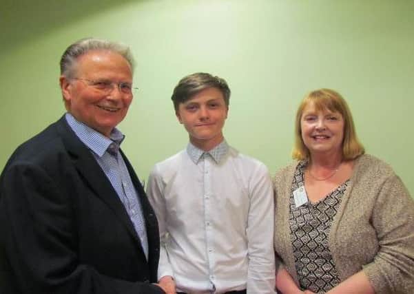 Tom Bateman with West Worthing Rotarians John Bayley (vice president) and Marian Milton (chair of the youth committee)