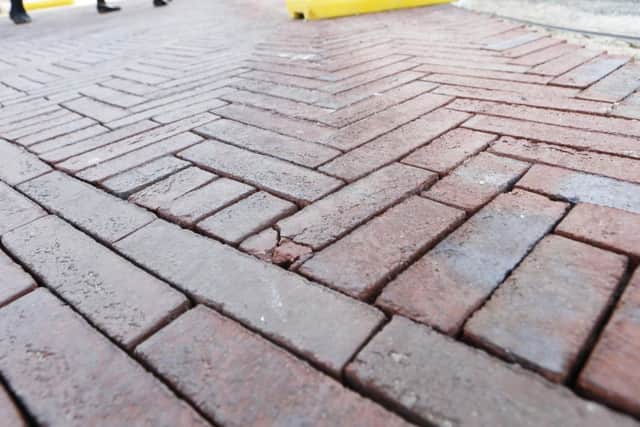 A few bricks in the Montague Street repaving have cracked. Picture: Eddie Mitchell